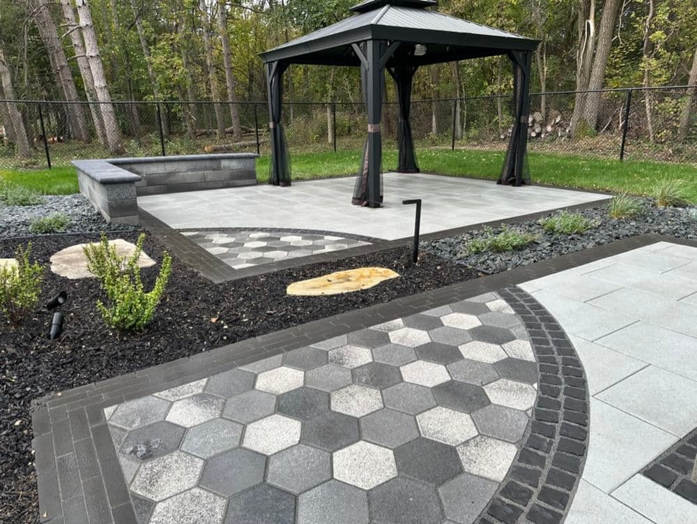 Backyard Transformation with Dual Patios and Pergola in Cottage Grove