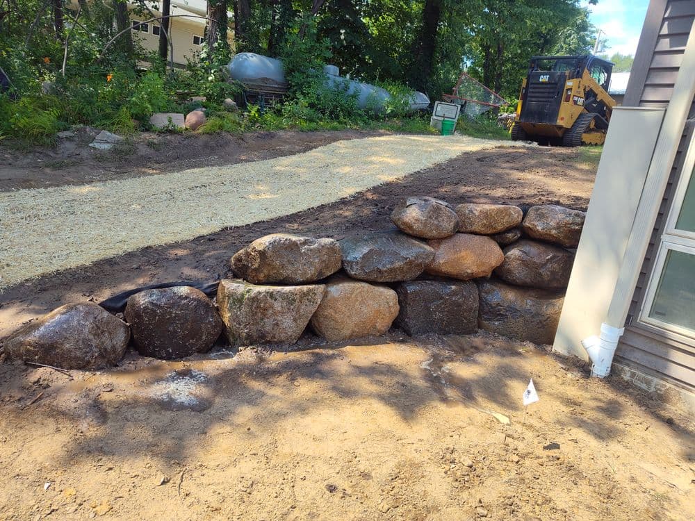 Fieldstone Boulder Retaining Wall Build in St Paul Park image