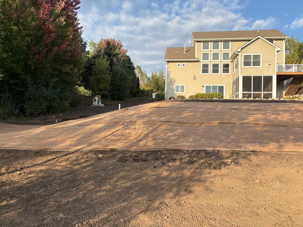 Gallery photos for Boulder Wall Extension, Seeding, and Landscaping in Hudson WI: Image #1