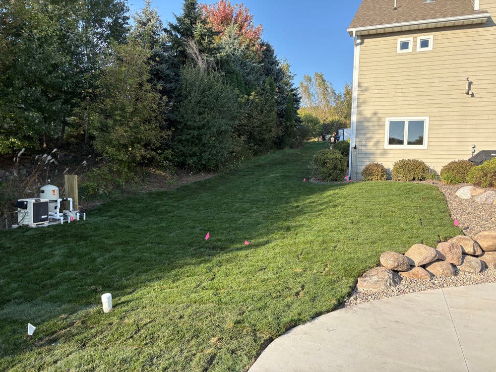 Gallery photos for Boulder Wall Extension, Seeding, and Landscaping in Hudson WI: Image #2