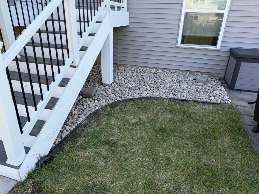 Gallery photos for River Rock Landscaping Beds Under Deck in Cottage Grove: Image #1