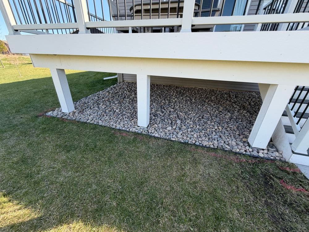 Project River Rock Landscaping Beds Under Deck in Cottage Grove image